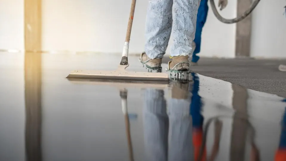 Man Laying Epoxy Floor With Roller